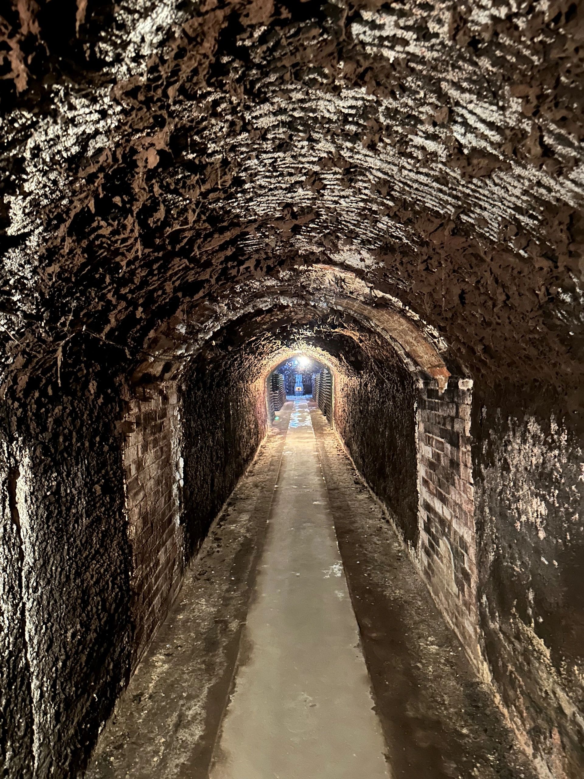 Underground tunnel with arched brick ceilings
